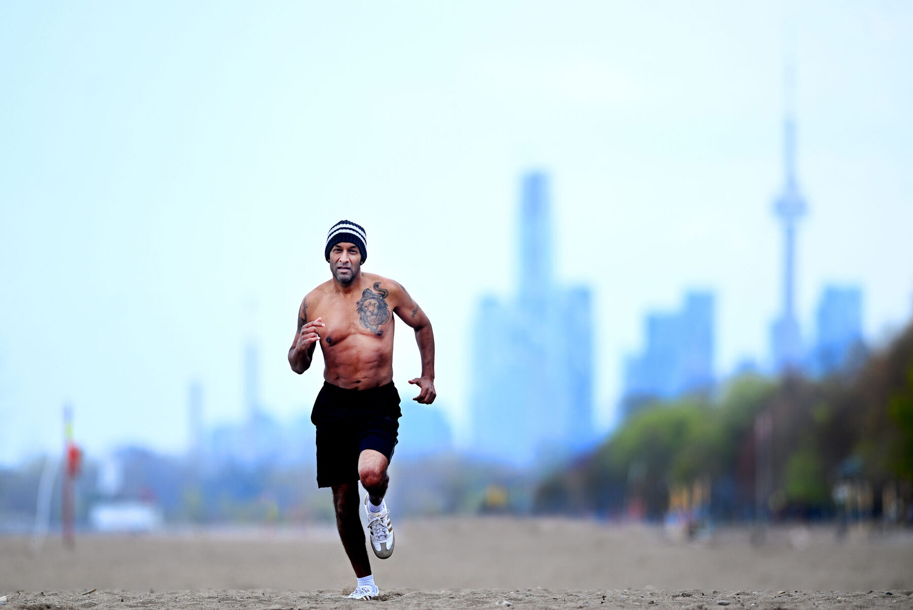 Dr. Sanjeev Goel running outdoors at golden hour, embodying the longevity protocols he teaches